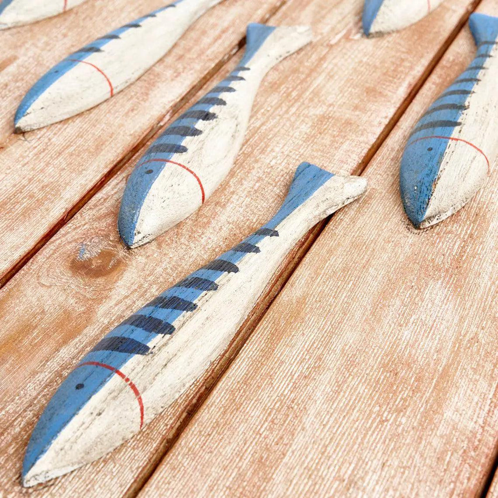 Panneau en bois avec petit poisson
